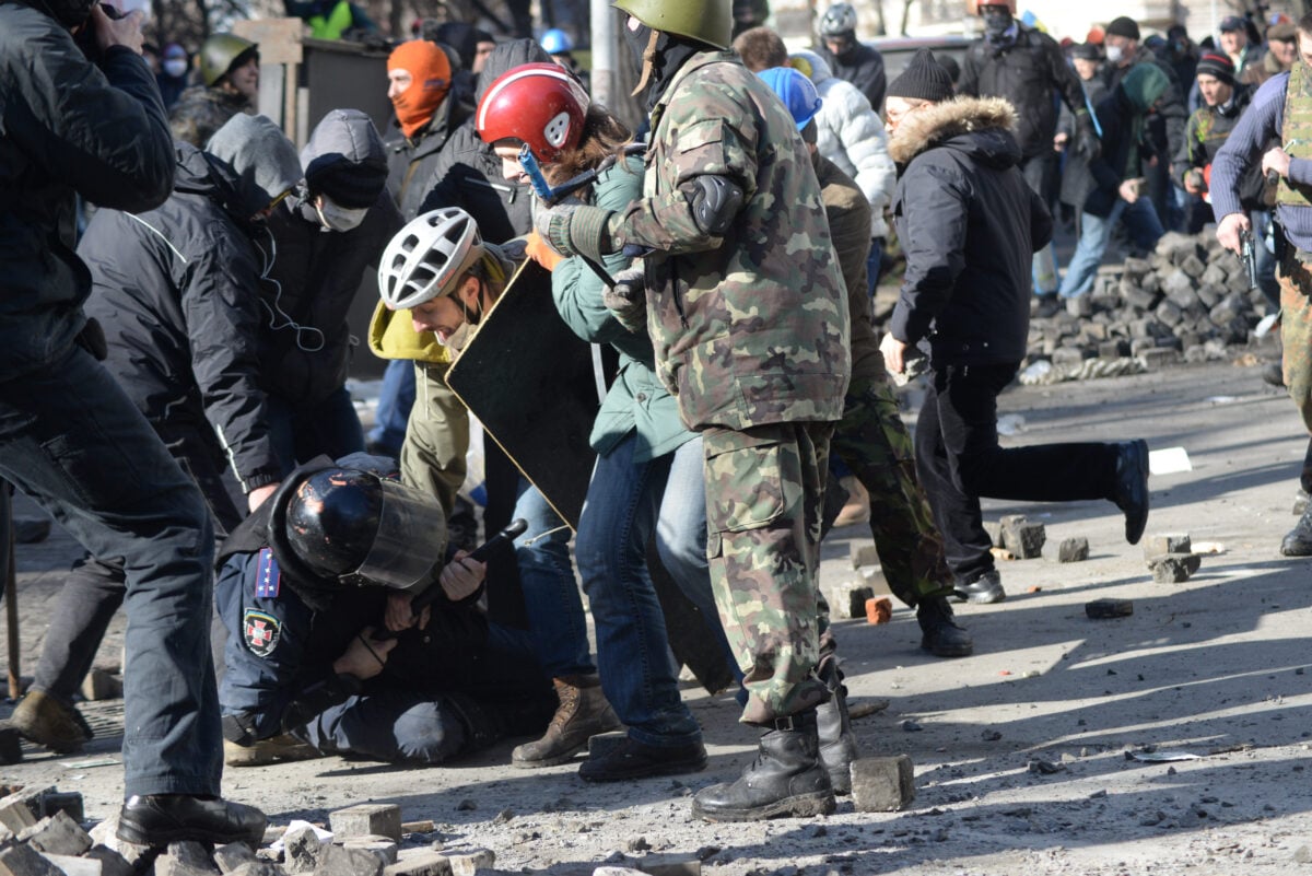 A police officer attacked by protesters during clashes in Ukraine, Kyiv. Events of February 18, 2014-1
