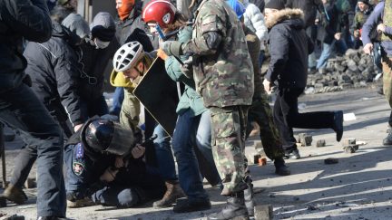 A police officer attacked by protesters during clashes in Ukraine, Kyiv. Events of February 18, 2014-1