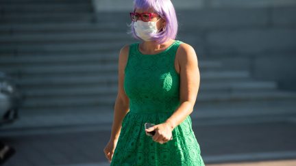 US Senator Kyrsten Sinema (D-AZ) wearing a mask to protect herself and others from COVID-19, known as coronavirus, leaves following a vote at the US Capitol in Washington, DC, May 4, 2020. (Photo by SAUL LOEB / AFP) (Photo by SAUL LOEB/AFP via Getty Images)