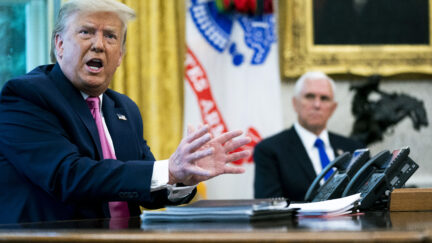 WASHINGTON, DC - JULY 20: U.S. President Donald Trump talks to reporters with Vice President Mike Pence in the Oval Office at the White House July 20, 2020 in Washington, DC. Trump hosted Republican Congressional leaders and members of his cabinet to talk about a proposed new round of financial stimulus to help the economy during the ongoing global coronavirus pandemic. (Photo by Doug Mills-Pool/Getty Images)