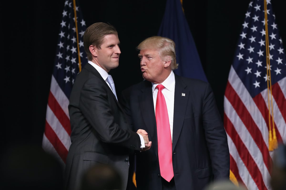 Donald Trump gives an "air kiss" to his son Eric Trump at a campaign rally