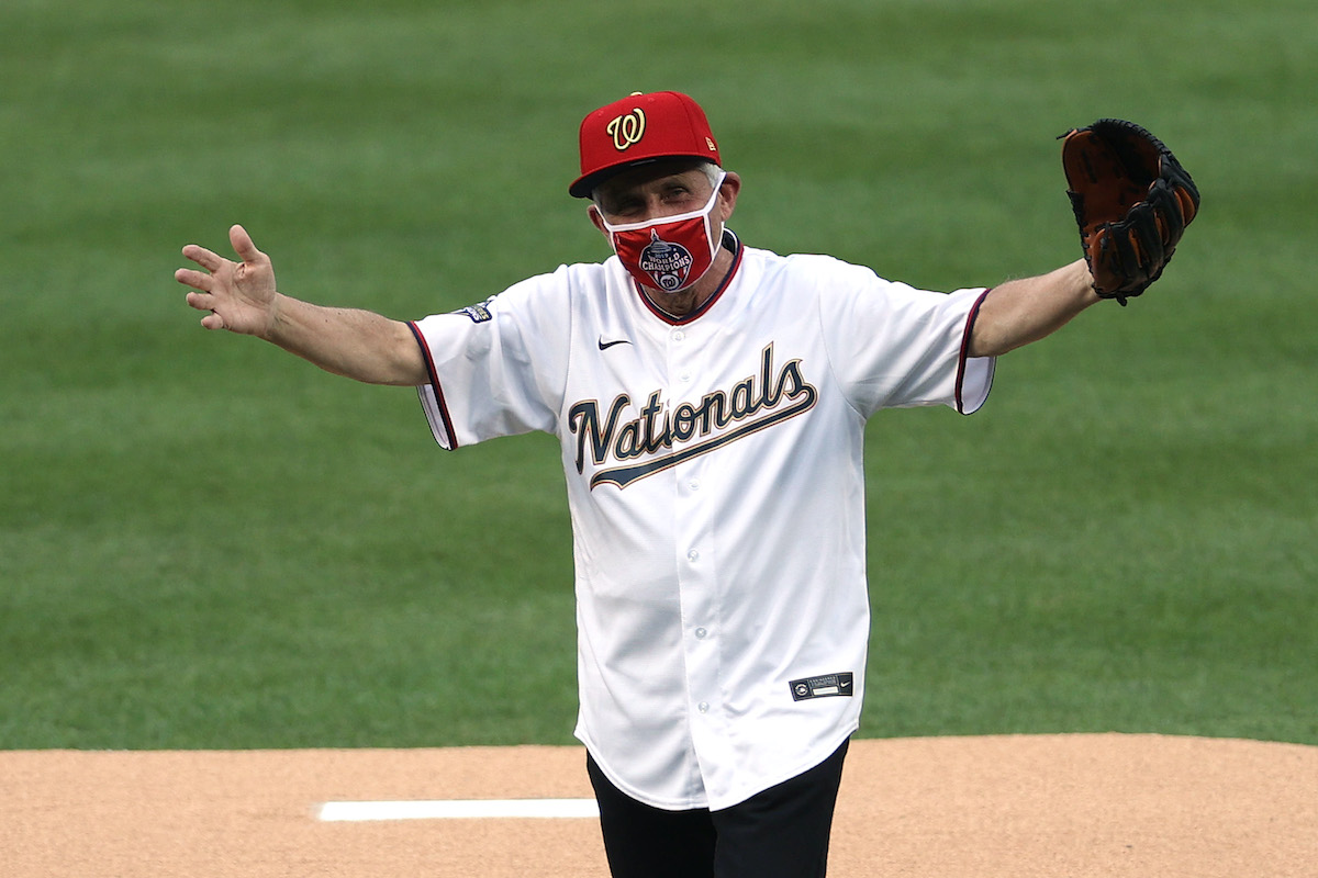 Dr. Anthony Fauci, director of the National Institute of Allergy and Infectious Diseases reacts after throwing out the ceremonial first pitch prior to the game between the New York Yankees and the Washington Nationals
