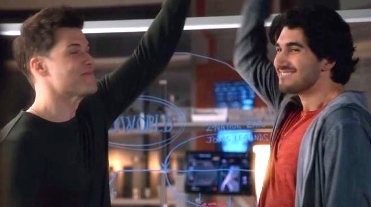 Nate and Behrad high five on The CW's Legends of Tomorrow.