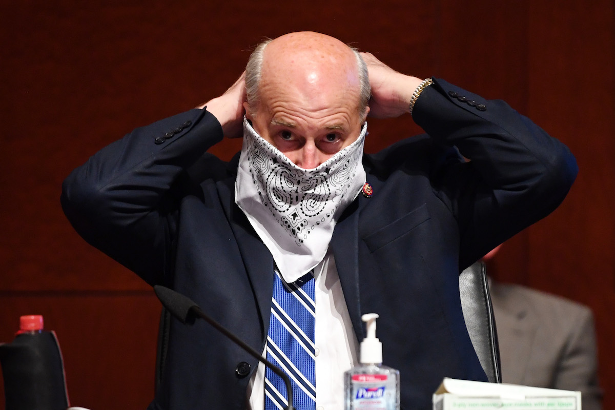U.S. Rep. Louie Gohmert (R-TX) adjusts his face mask during a House Judiciary Committee markup