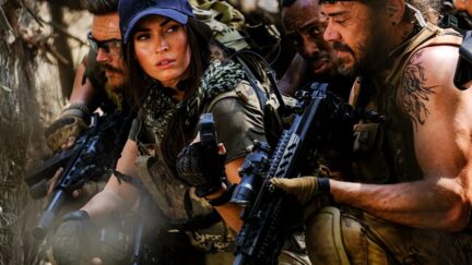 Megan Fox and Greg Kriek in Rogue (2020)