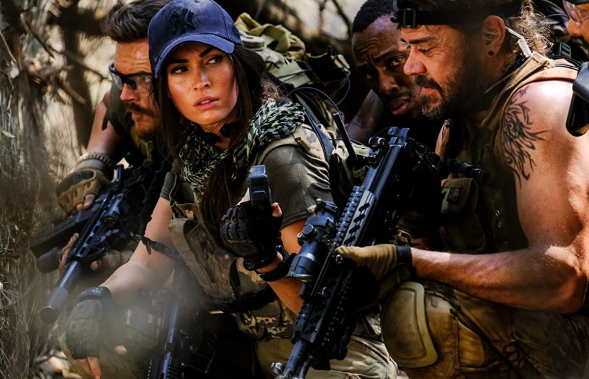 Megan Fox and Greg Kriek in Rogue (2020)