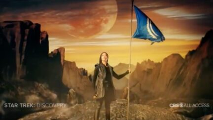 ommander Burnham (Sonequa Martin-Green) planting a tattered Federation flag on a desolate planetommander Burnham (Sonequa Martin-Green) planting a tattered Federation flag on a desolate planet