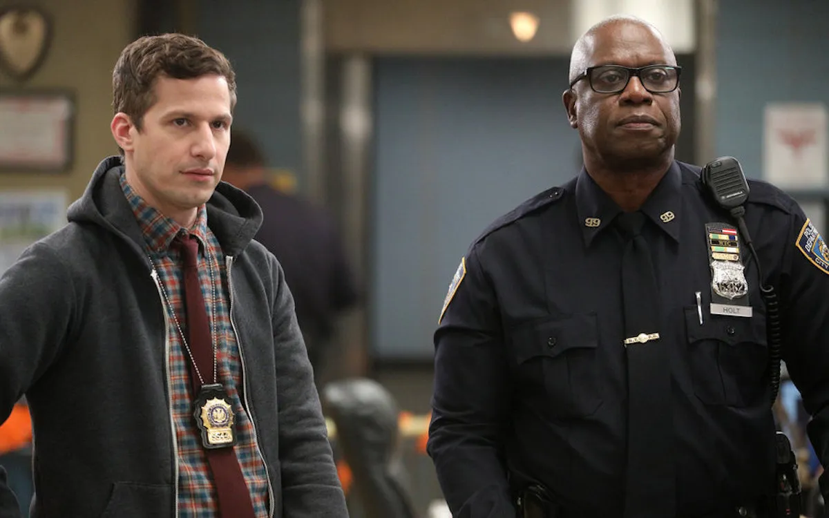Andy Samberg as Jake Peralta, Andre Braugher as Ray Holt look disapproving.