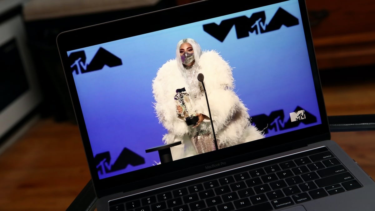 2020 MTV Video Music Awards NEW YORK, NY - AUGUST 30: In this photo illustration, Lady Gaga accepts the Artist of the Year award, viewed on a laptop, during the 2020 MTV Video Music Awards broadcast on August 30, 2020 in New York City. (Photo Illustration by Cindy Ord/Getty Images)