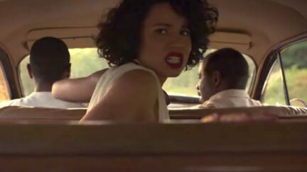 Atticus (Jonathan Majors), Letitia (Jurnee Smollett), and George (Courtney B. Vance) in sundown chase