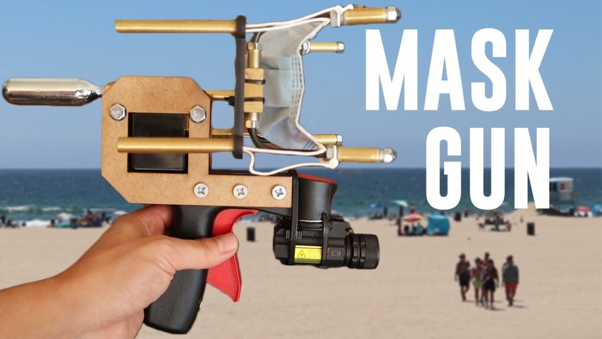 YouTube thumbnail image of the mask gun with a beach backdrop.