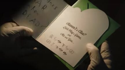 The Batman card with the Riddler's secret coded message