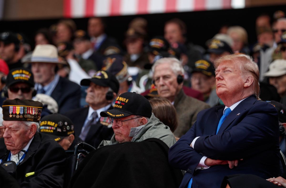US President Donald Trump attends a French-US ceremony at the Normandy American Cemetery and Memorial in Colleville-sur-Mer, Normandy, northwestern France, on June 6, 2019, as part of D-Day commemorations marking the 75th anniversary of the World War II Allied landings in Normandy. (Photo by Ian LANGSDON / POOL / AFP) (Photo credit should read IAN LANGSDON/AFP via Getty Images)