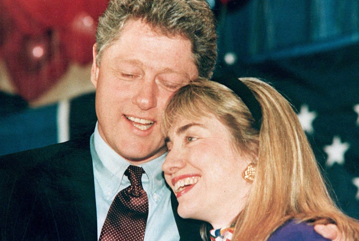 WASHINGTON, : A 1992 photo shows then Governor of Arkansas Bill Clinton (L) and his wife Hillary (R) embracing. Clinton has been accused of having an affair with a former White House intern, Monica Lewinsky, and during a depostion 17 January in the Paula Jones sexual harrassment suit, he admitted to having a relationship with Gennifer Flowers when he was governor. (Photo credit should read AFP/AFP via Getty Images)