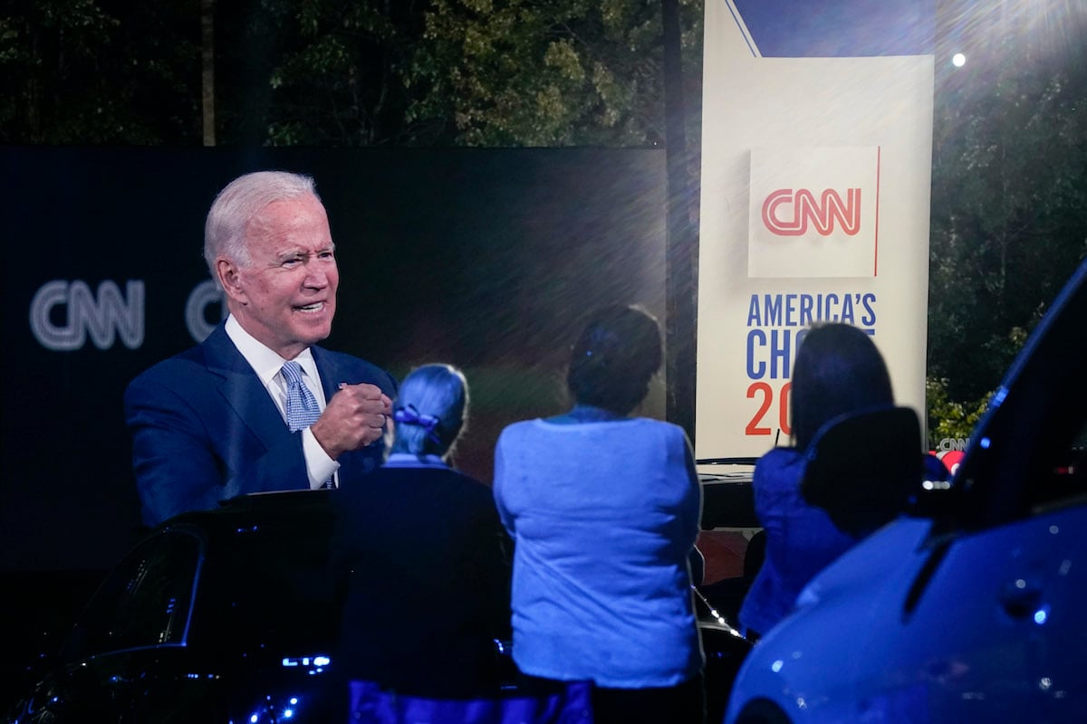 Joe Biden is projected onto a drive-in screen for CNN's town hall event.