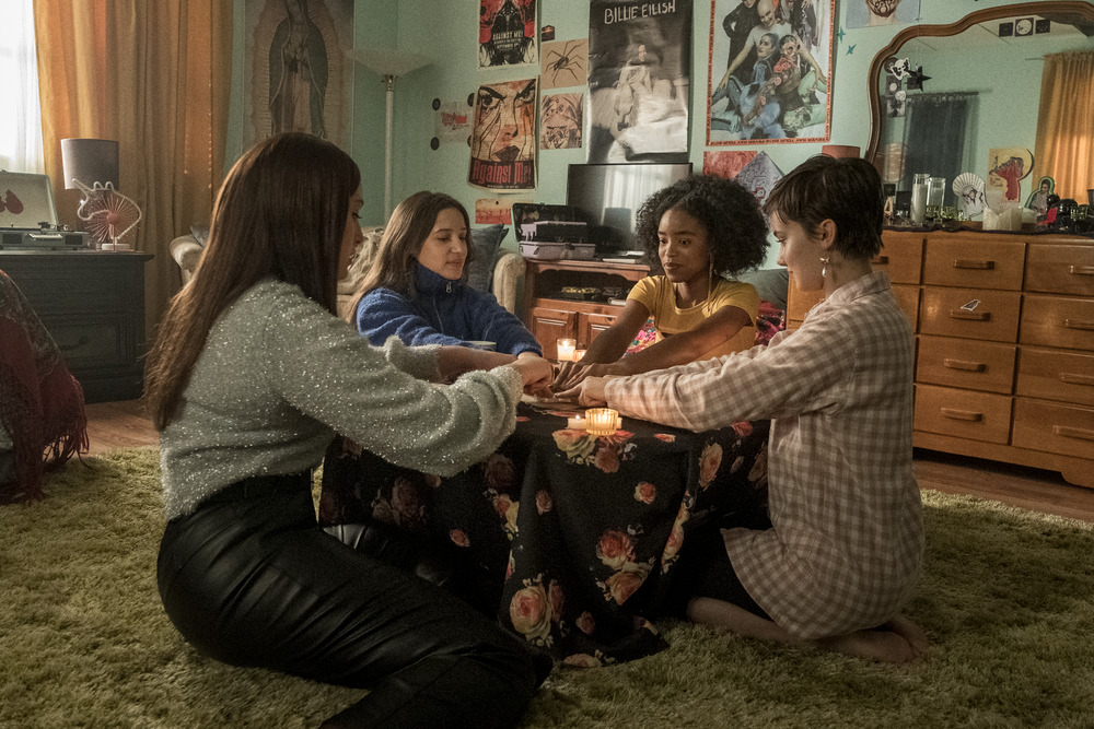(l-r) Lourdes (Zoey Luna) Frankie (Gideon Adlon) Tabby (Lovie Simone) and Lily (Cailee Spaeny) perform rituals and talk about being cautious with their gifts in Columbia Pictures' THE CRAFT: LEGACY.