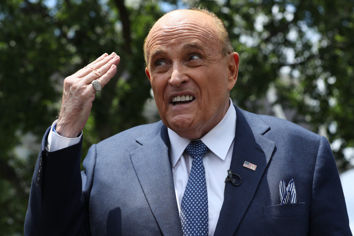 WASHINGTON, DC - JULY 01: President Donald Trump's lawyer and former New York City Mayor Rudy Giuliani talks to journalists outside the White House West Wing July 01, 2020 in Washington, DC. Giuliani did an on-camera interview with One America News Network's Chanel Rion before talking to other journalists about Vice President Joe Biden and the news that Russian intelligence may have paid Taliban operatives to kill U.S. troops in Afghanistan. (Photo by Chip Somodevilla/Getty Images)