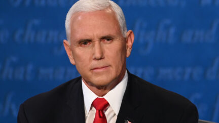 Mike Pence looks on during the vice presidential debate
