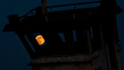 This picture taken on June 5, 2020 shows a view of the full moon during the 