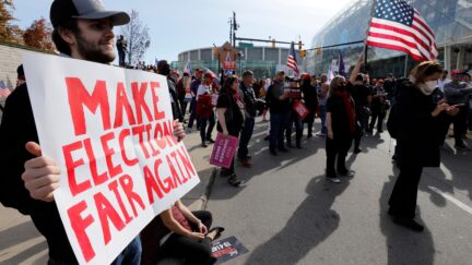 Supporters of US President Donald Trump demonstrate outside of the TCF Center to protest the counting of votes for the 2020 general election on November 6, 2020 in Detroit, Michigan. (Photo by JEFF KOWALSKY / AFP) (Photo by JEFF KOWALSKY/AFP via Getty Images)