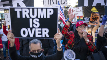 WASHINGTON, DC - NOVEMBER 13: Supporters of U.S. President Donald Trump and counter protesters demonstrate outside of the White House ahead of Saturday's Million MAGA March on November 13, 2020 in Washington, DC. Supporters clashed with protesters organized by Shutdown DC at Black Lives Matter Plaza.