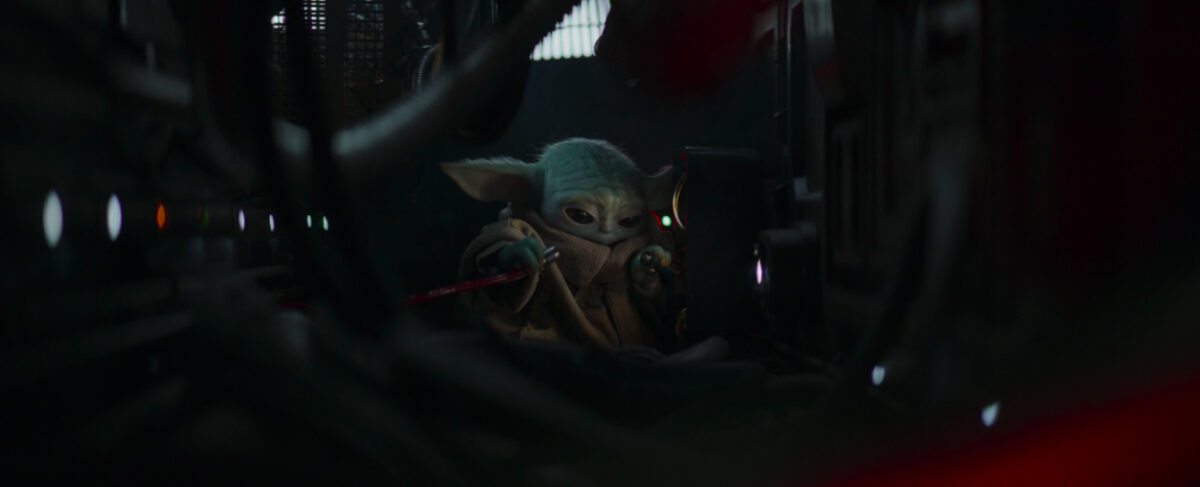 baby yoda fixing a ship