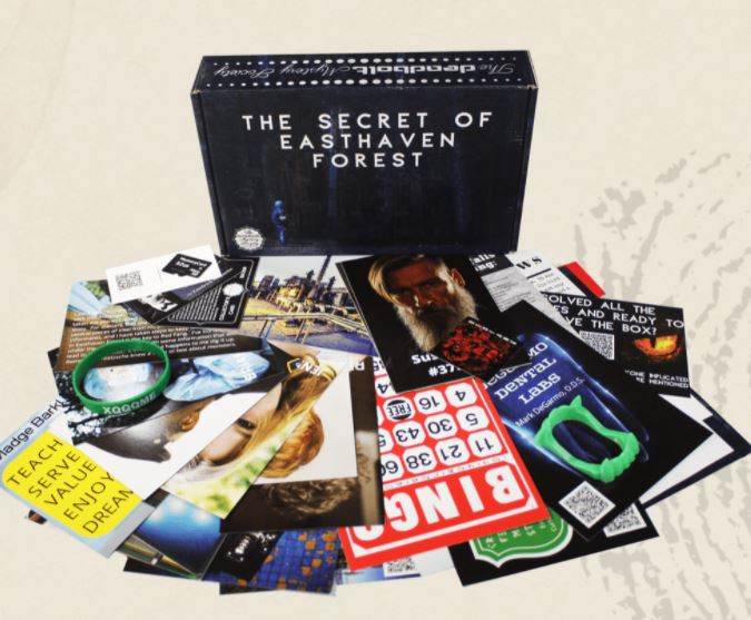 box of clues from the deadbolt mystery society