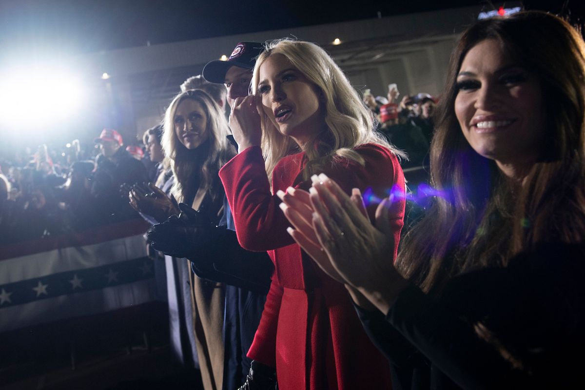 Lara Trump, Senior Advisors Jared Kushner and Ivanka Trump, Kimberly Guilfoyle, and others clap for Donald Trump at a rally.