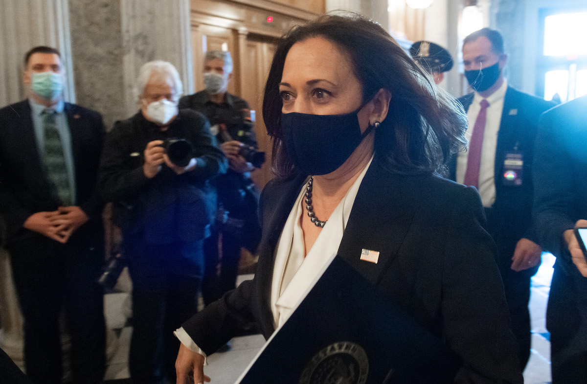 US Vice President-elect and Senator (D-CA) Kamala Harris arrives for a vote on the Senate floor of the US Capitol