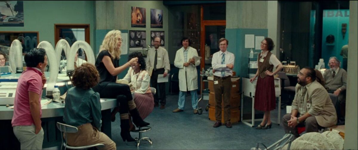 Barbara talking with her coworkers