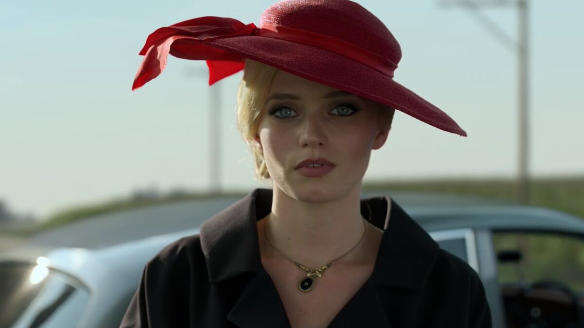 Christina stepping out of her car in Lovecraft Country