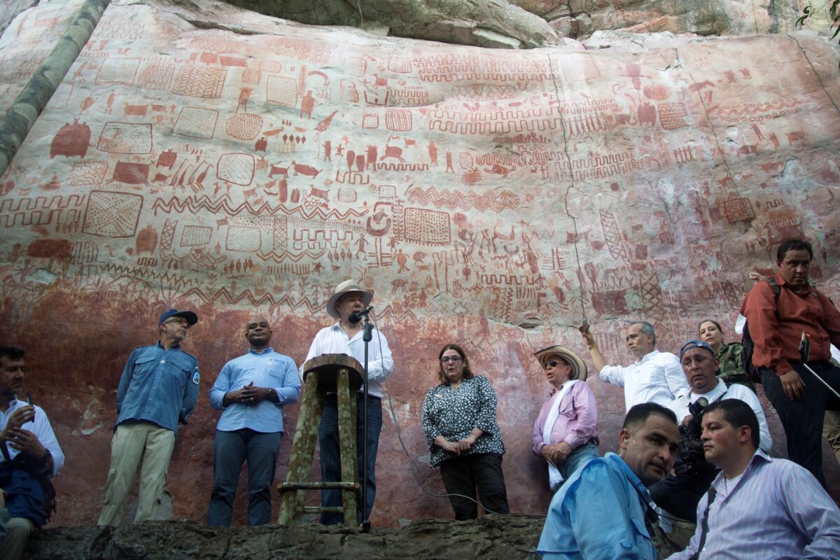 Colombian President Juan Manuel Santos speaks during a press conference to announce the expansion by 1.5 million hectares of the Chiribiquete National Park -named UNESCO's World Heritage site on the eve- at the Cerro Azul in the Serrania La Lindosa, department of Guaviare, Colombia, on July 2, 2018. - Both the Serranias of Chiribiquete and La Lindosa had been closed to outsiders for many years during the armed conflict and are now opening up to scientific research. (Photo by Diana Sanchez / AFP) (Photo credit should read DIANA SANCHEZ/AFP via Getty Images)