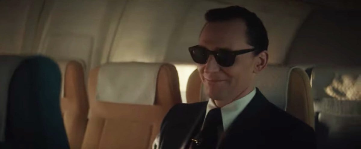 Loki smirking wearing sunglasses