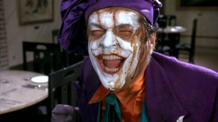 Jack Nicholson's Joker with makeup running down his face.