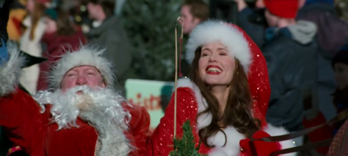 Geena Davis in Long Kiss Goodnight in a Christmas parade.