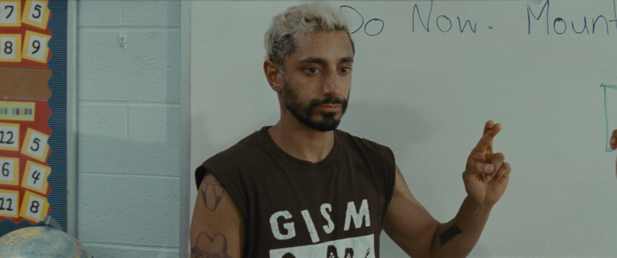 Riz Ahmed signs the letter R in sound of metal