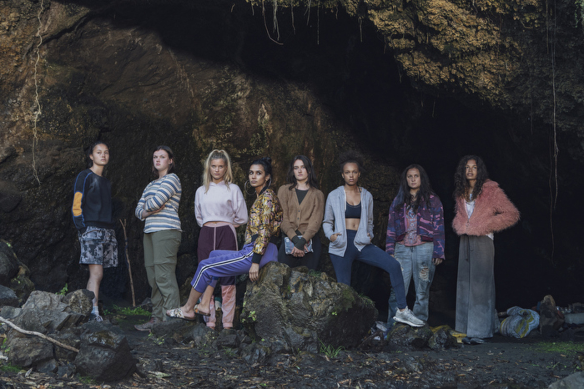 Eight girls stand on a cold beach in 'The Wilds'