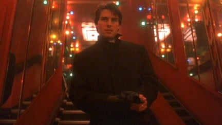 Tom Cruise surrounded by Christmas lights in Eyes Wide Shut.
