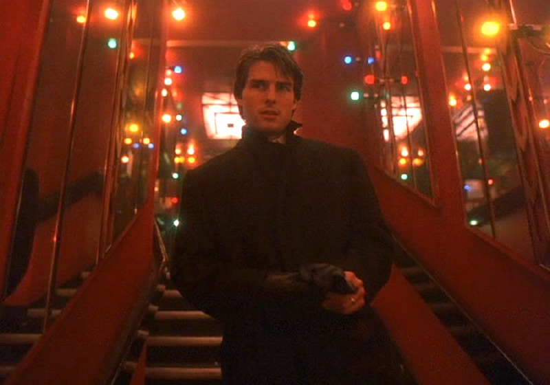 Tom Cruise surrounded by Christmas lights in Eyes Wide Shut.