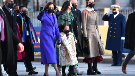 WASHINGTON, DC - JANUARY 20: U.S. Vice President Kamala Harris, husband Doug Emhoff, her great niece Amara, and family members walk the abbreviated parade route after U.S. President Joe Biden's inauguration on January 20, 2021 in Washington, DC. Biden became the 46th president of the United States earlier today during the ceremony at the U.S. Capitol. (Photo by Mark Makela/Getty Images)