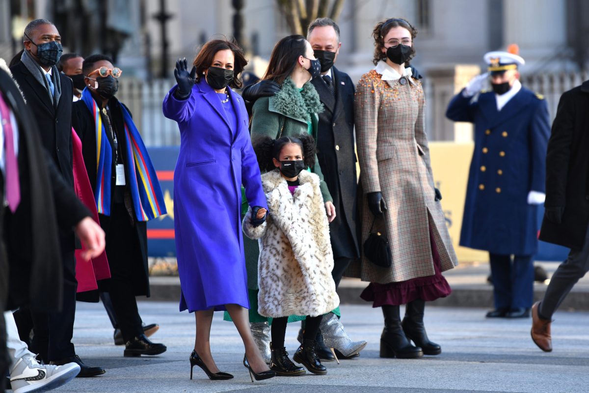 WASHINGTON, DC - JANUARY 20: U.S. Vice President Kamala Harris, husband Doug Emhoff, her great niece Amara, and family members walk the abbreviated parade route after U.S. President Joe Biden's inauguration on January 20, 2021 in Washington, DC. Biden became the 46th president of the United States earlier today during the ceremony at the U.S. Capitol. (Photo by Mark Makela/Getty Images)