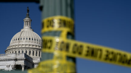 Police tape hangs near the U.S. Capitol