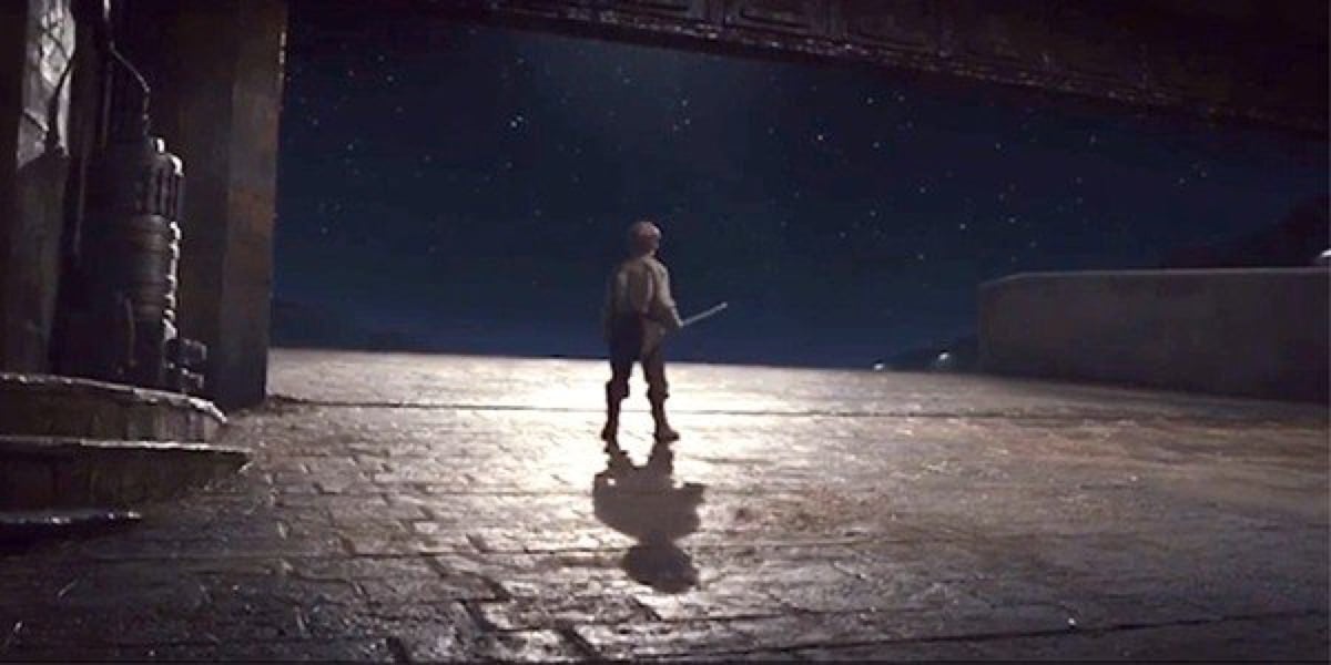 "Broom kid" looking out into space at the end of Star Wars: The Last Jedi.