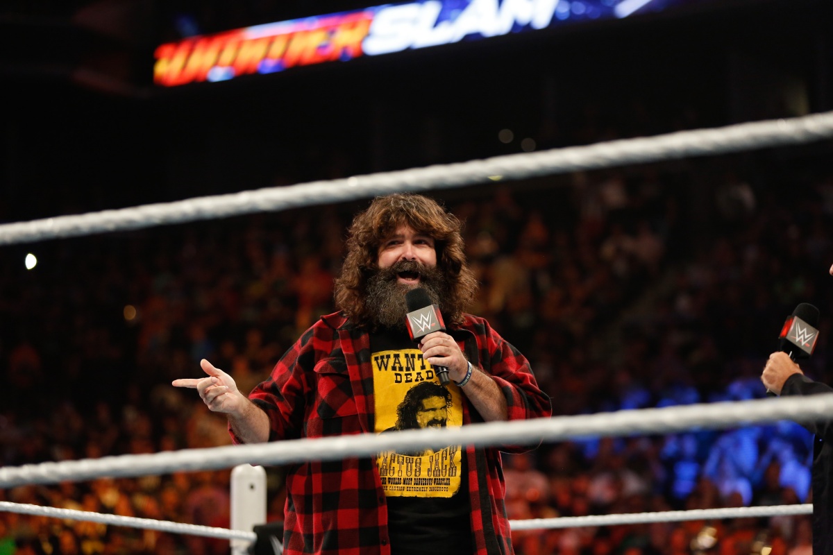 NEW YORK, NY - AUGUST 23: Mick Foley greets the audience at WWE SummerSlam 2015 at Barclays Center of Brooklyn on August 23, 2015 in New York City. (Photo by JP Yim/Getty Images)