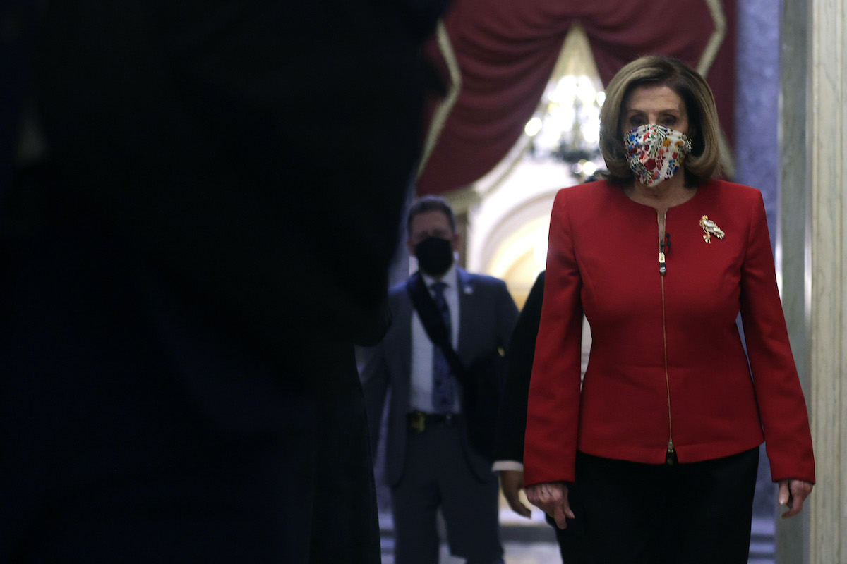 Rep. Nancy Pelosi (D-CA) walks in a hallway at the U.S. Capitol