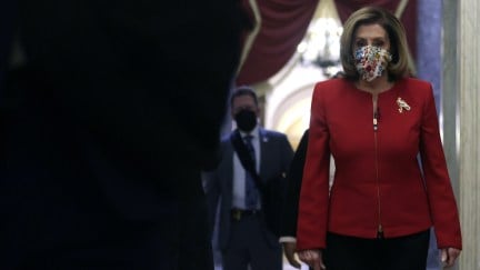 Rep. Nancy Pelosi (D-CA) walks in a hallway at the U.S. Capitol
