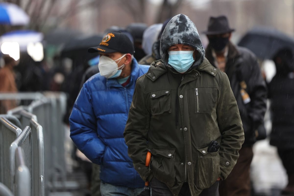 People wait in line to get COVID-19 vaccination at Yankee Stadium.