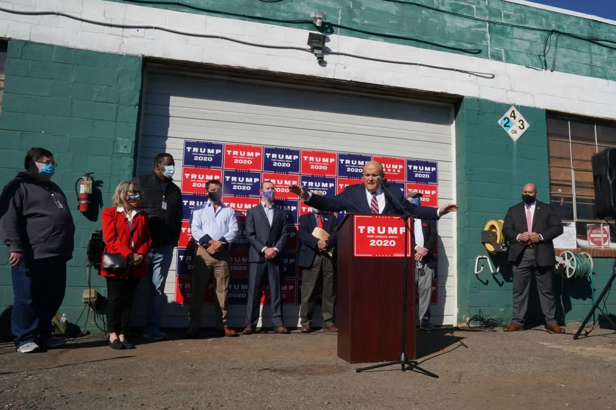 Attorney for the President, Rudy Giuliani, speaks at a news conference in the parking lot of a landscaping company on November 7, 2020 in Philadelphia. - Joe Biden has won the US presidency over Donald Trump, TV networks projected on November 7, 2020. CNN, NBC News and CBS News called the race in his favor, after projecting he had won the decisive state of Pennsylvania. (Photo by Bryan R. Smith / AFP) (Photo by BRYAN R. SMITH/AFP via Getty Images)