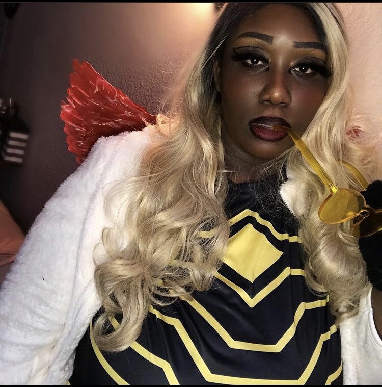 Michelle (Chelle/ChelleTheCherry) cosplaying as Hawks