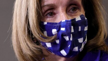 House Speaker Nancy Pelosi joins House impeachment managers at a press conference.